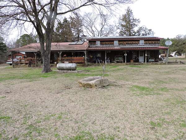 110 Acres of Land with Home for Sale in Mena, Arkansas