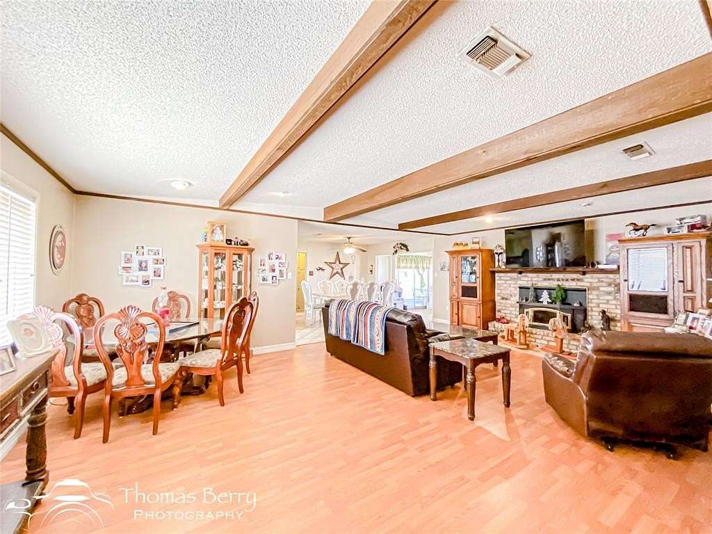 5 Acres of Residential Land with Home for Sale in Snyder, Texas