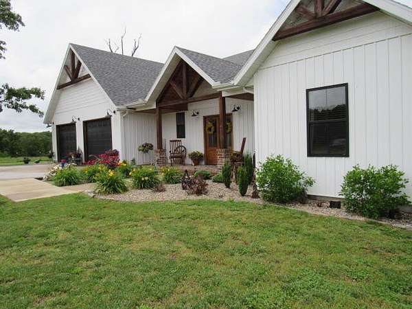 70 Acres of Recreational Land with Home for Sale in Norwood, Missouri