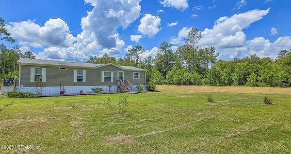 7.16 Acres of Residential Land with Home for Sale in Callahan, Florida