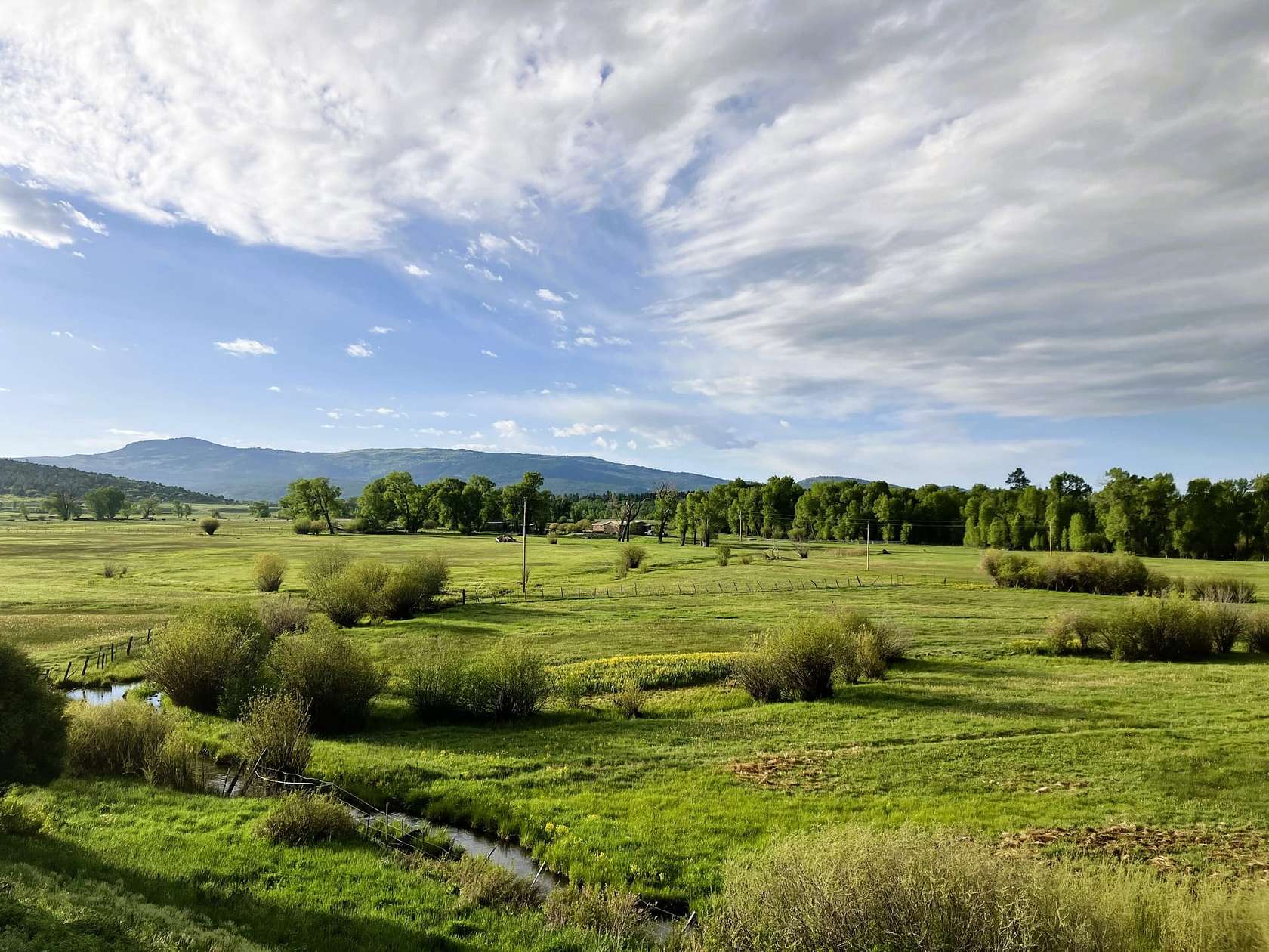 28 Acres of Land with Home for Sale in Los Ojos, New Mexico