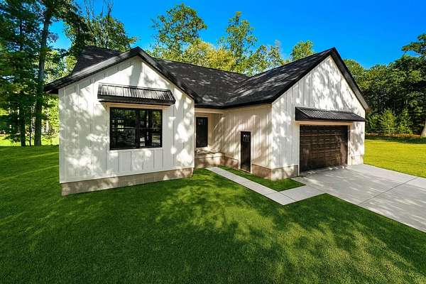 0.5 Acres of Residential Land with Home for Sale in Prudenville, Michigan