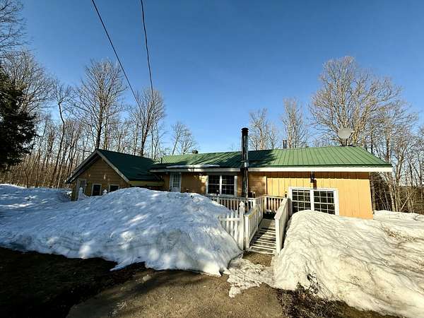 18.7 Acres of Land with Home for Sale in St. Regis Falls, New York