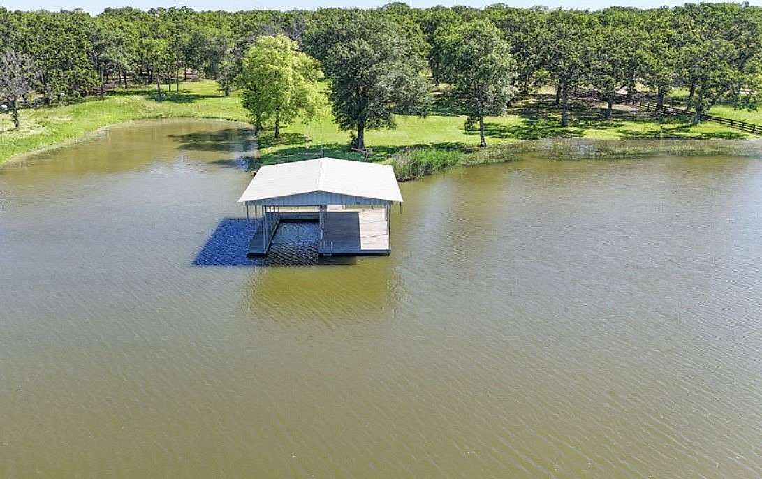 2.5 Acres of Land with Home for Sale in Quinlan, Texas