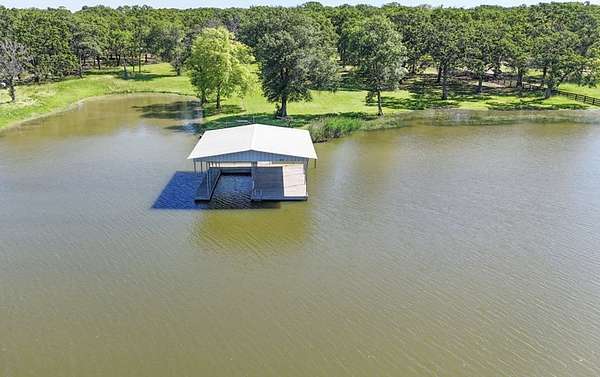 2.5 Acres of Land with Home for Sale in Quinlan, Texas