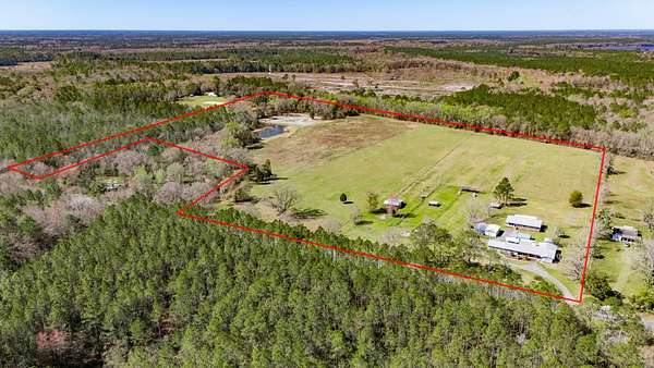 34 Acres of Agricultural Land with Home for Sale in Hampton, Florida