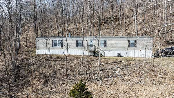 4.2 Acres of Residential Land with Home for Sale in Vanceburg, Kentucky