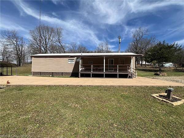 2.7 Acres of Residential Land with Home for Sale in Howe, Oklahoma