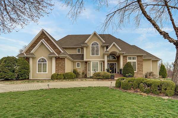 75.6 Acres of Recreational Land with Home for Sale in Lamar, Missouri