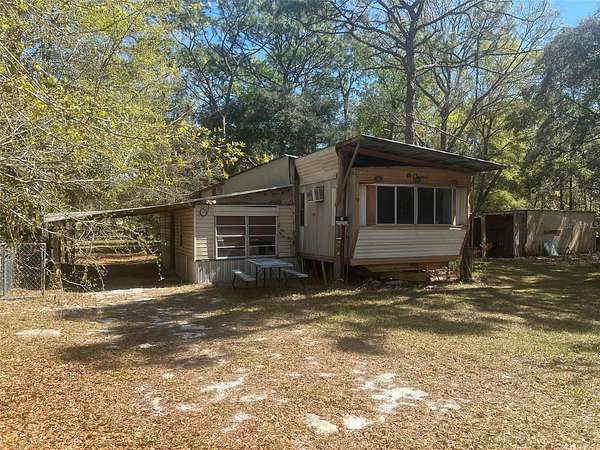 4.89 Acres of Land with Home for Sale in Ocklawaha, Florida