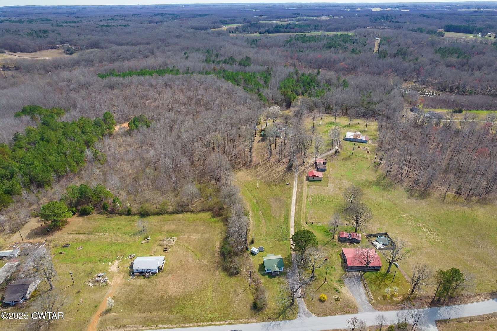 62 Acres of Land with Home for Sale in Beech Bluff, Tennessee