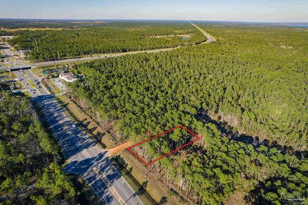 0.56 Acres of Commercial Land for Sale in Milton, Florida