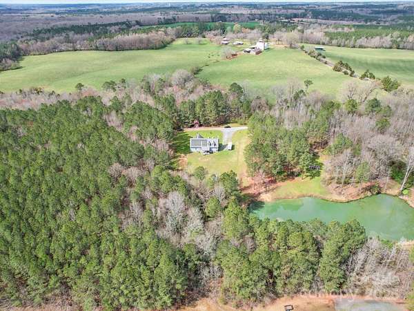 18.9 Acres of Recreational Land with Home for Sale in Polkton, North Carolina