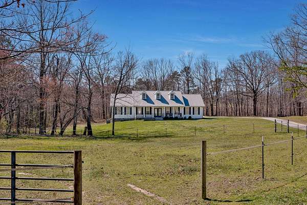 5 Acres of Residential Land with Home for Sale in Bryant, Alabama