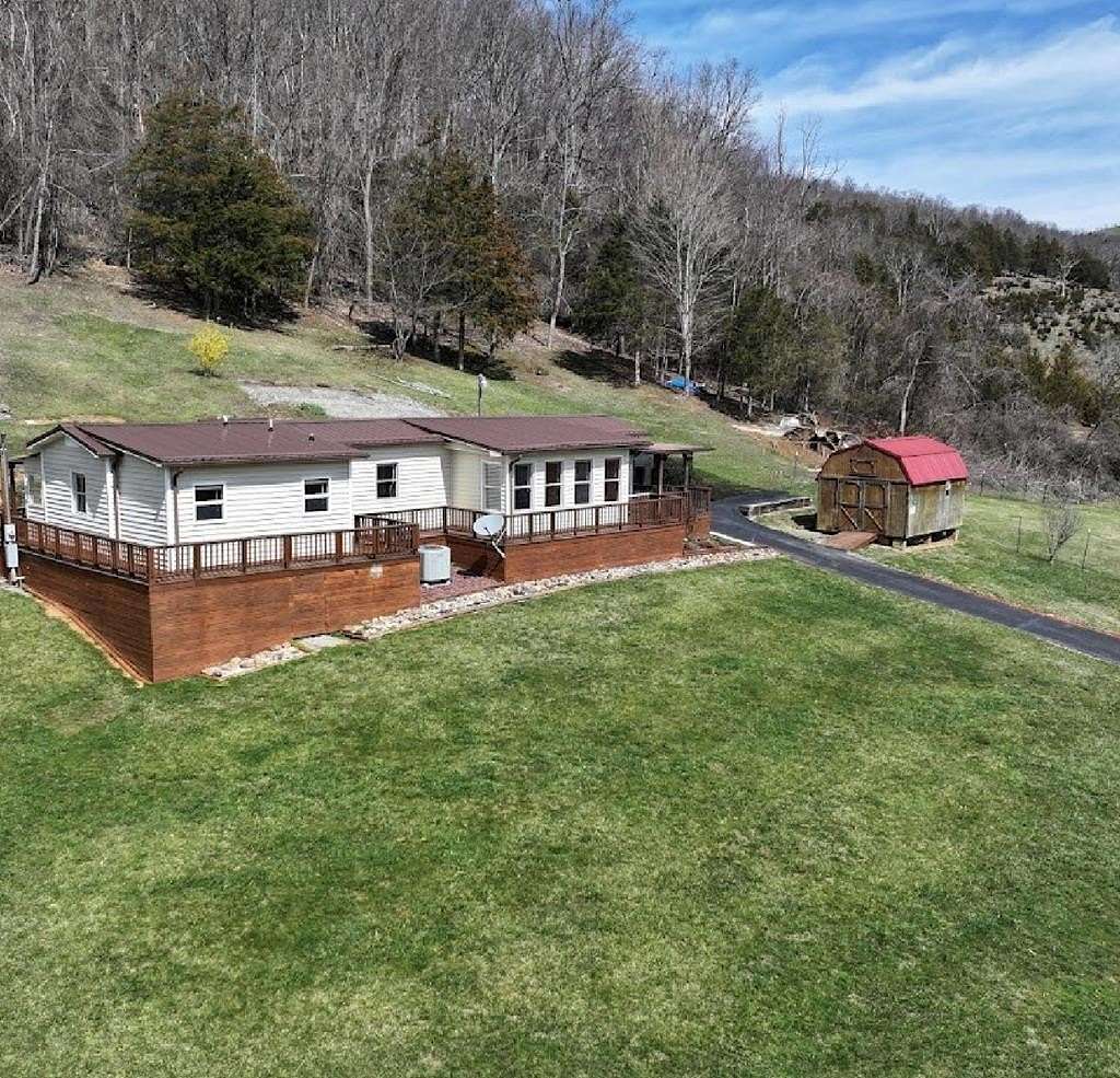 9.5 Acres of Residential Land with Home for Sale in Honaker, Virginia