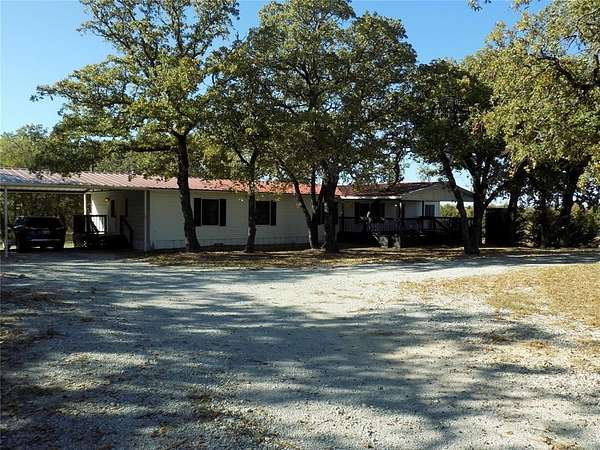 3 Acres of Residential Land with Home for Sale in Springtown, Texas