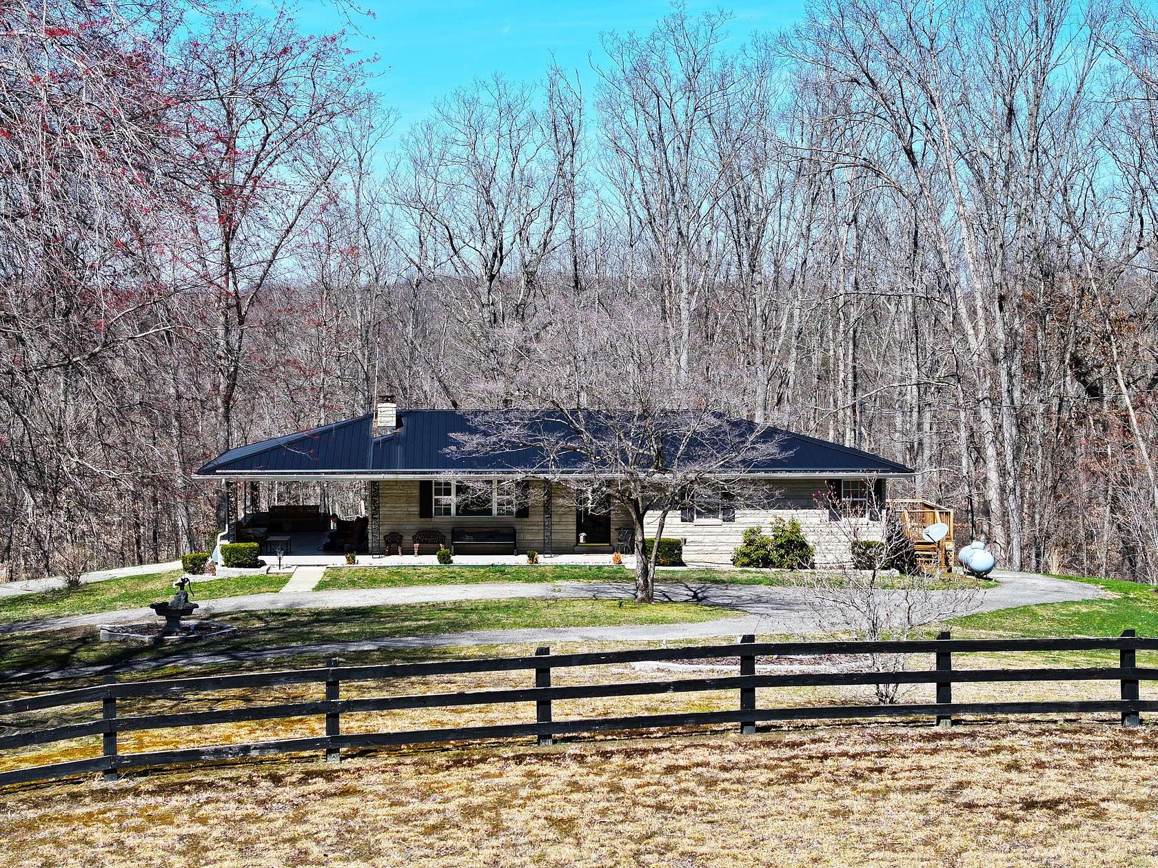 4 Acres of Residential Land with Home for Sale in Irvine, Kentucky