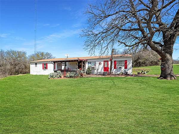 5 Acres of Land with Home for Sale in Poolville, Texas