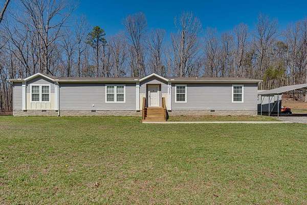 5 Acres of Residential Land with Home for Sale in Graysville, Tennessee