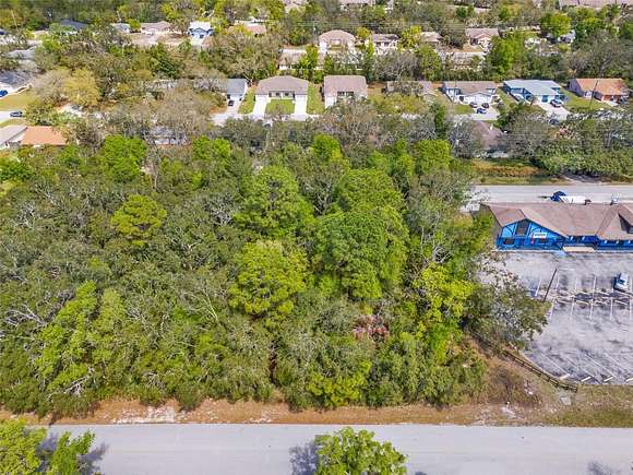 0.84 Acres of Commercial Land for Sale in Spring Hill, Florida