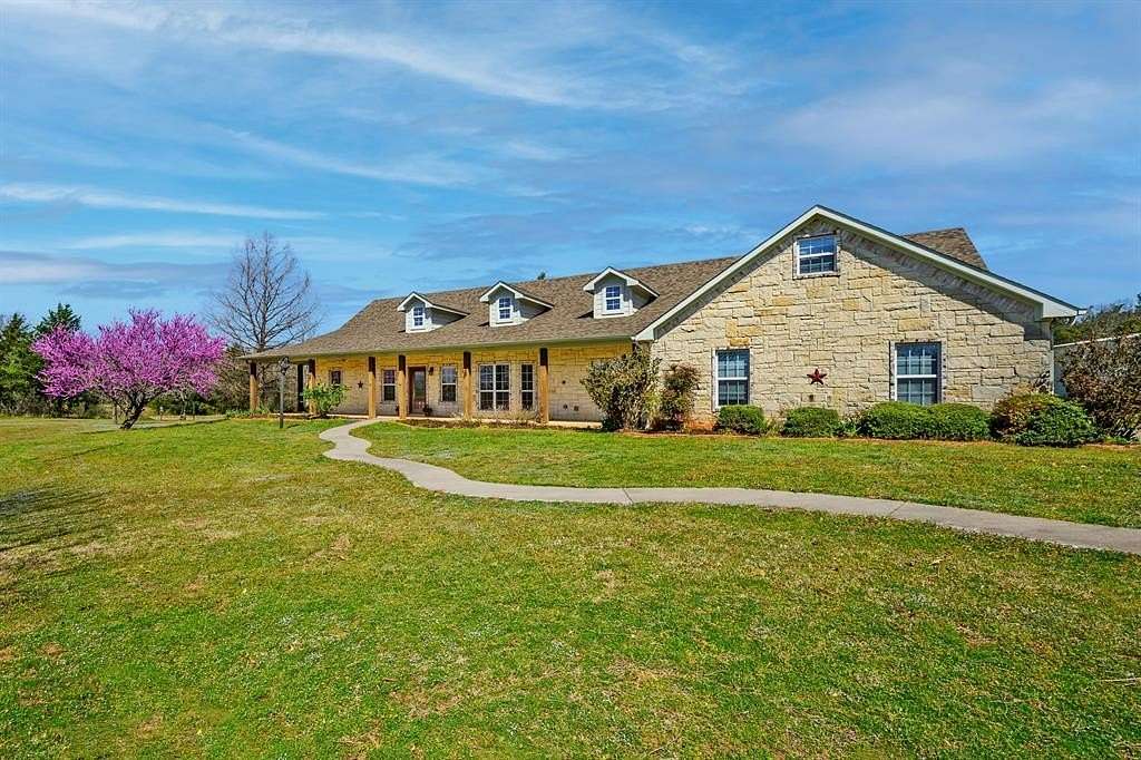 61.9 Acres of Land with Home for Sale in Denison, Texas