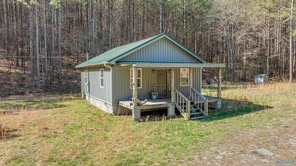 203 Acres of Land with Home for Sale in Collinsville, Alabama