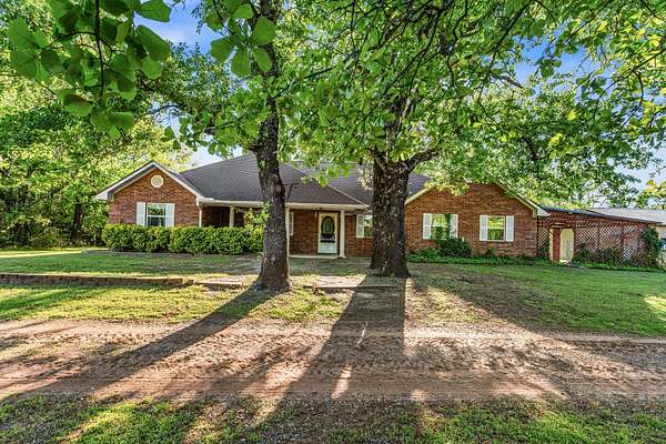 39.7 Acres of Recreational Land with Home for Sale in Mead, Oklahoma