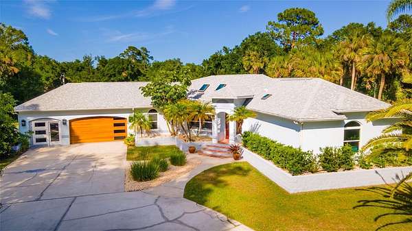 5.2 Acres of Residential Land with Home for Sale in New Smyrna Beach, Florida