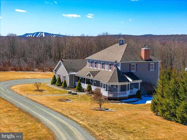 12 Acres of Land with Home for Sale in Thompson, Pennsylvania