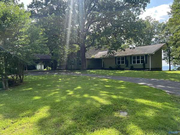 3.7 Acres of Residential Land with Home for Sale in Fort Payne, Alabama