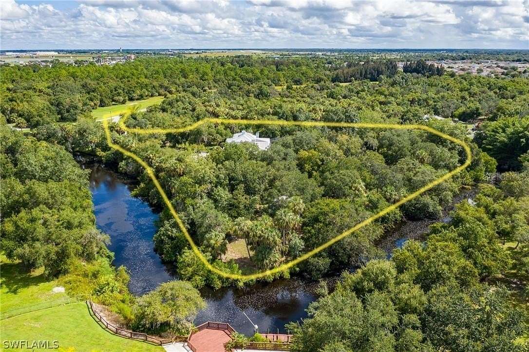 2.78 Acres of Residential Land with Home for Sale in Punta Gorda, Florida