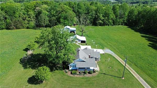 13 Acres of Land with Home for Sale in Roaring River, North Carolina