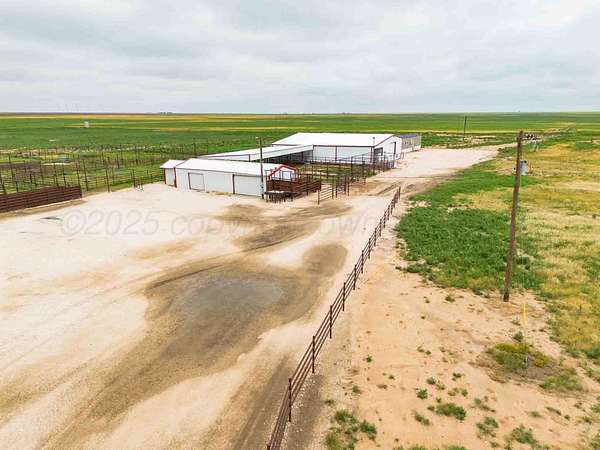 1,326 Acres of Agricultural Land with Home for Sale in Friona, Texas