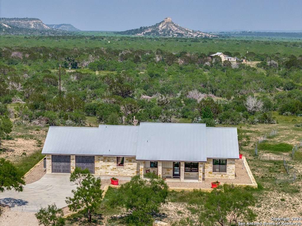 66.7 Acres of Recreational Land with Home for Sale in Junction, Texas