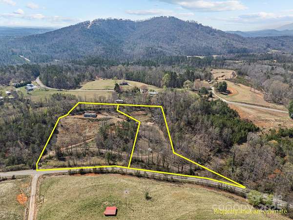 5.57 Acres of Residential Land with Home for Sale in Lake Lure, North Carolina