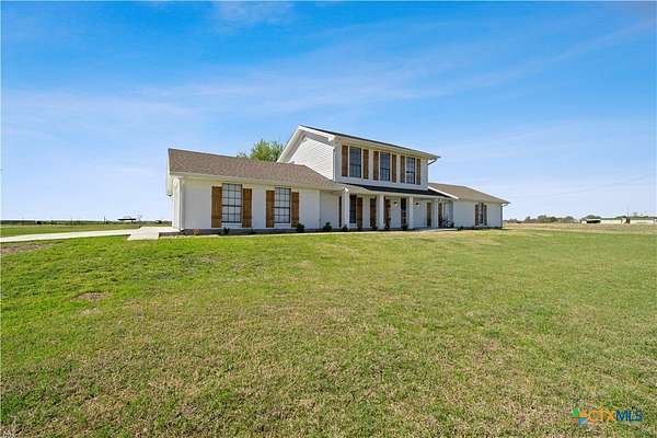 10 Acres of Land with Home for Sale in Rogers, Texas