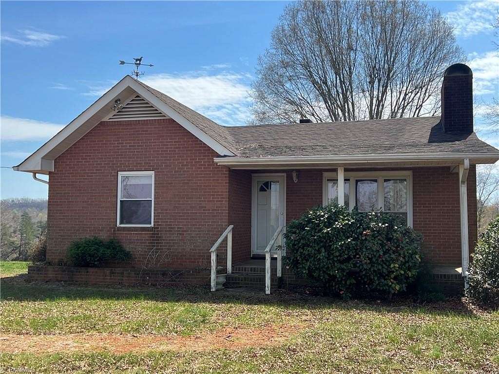 55.6 Acres of Recreational Land with Home for Sale in East Bend, North Carolina