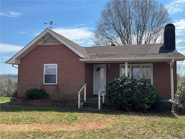 55.6 Acres of Recreational Land with Home for Sale in East Bend, North Carolina