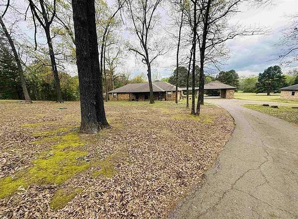 4.3 Acres of Residential Land with Home for Sale in Pittsburg, Texas