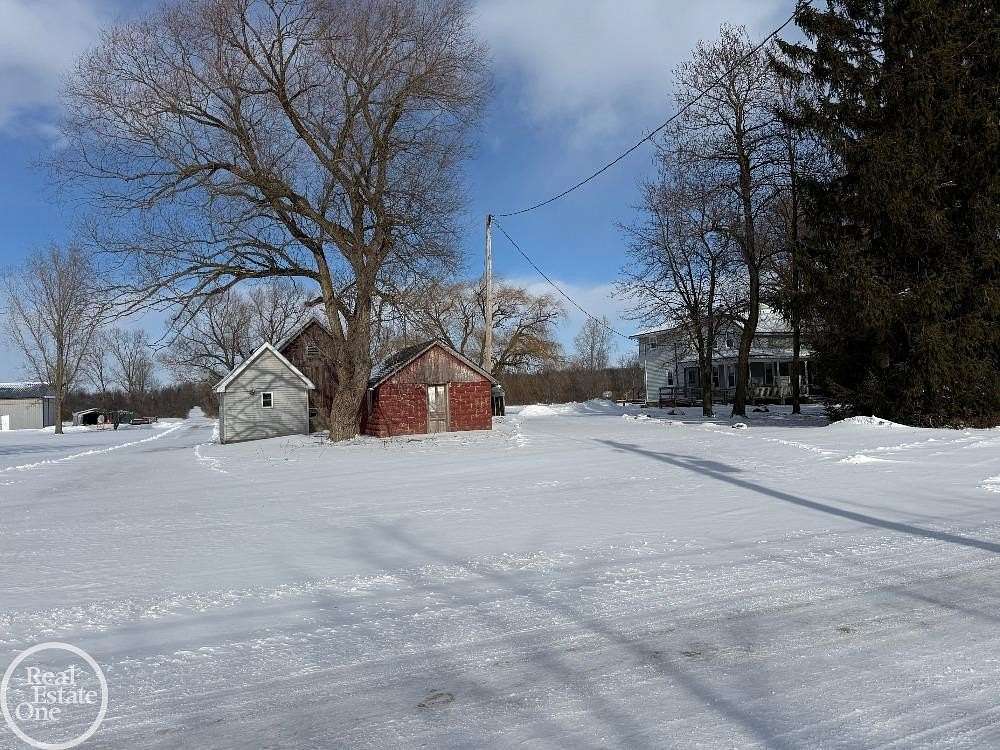 46.8 Acres of Agricultural Land with Home for Sale in Capac, Michigan