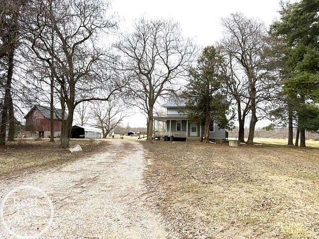46.8 Acres of Agricultural Land with Home for Sale in Capac, Michigan