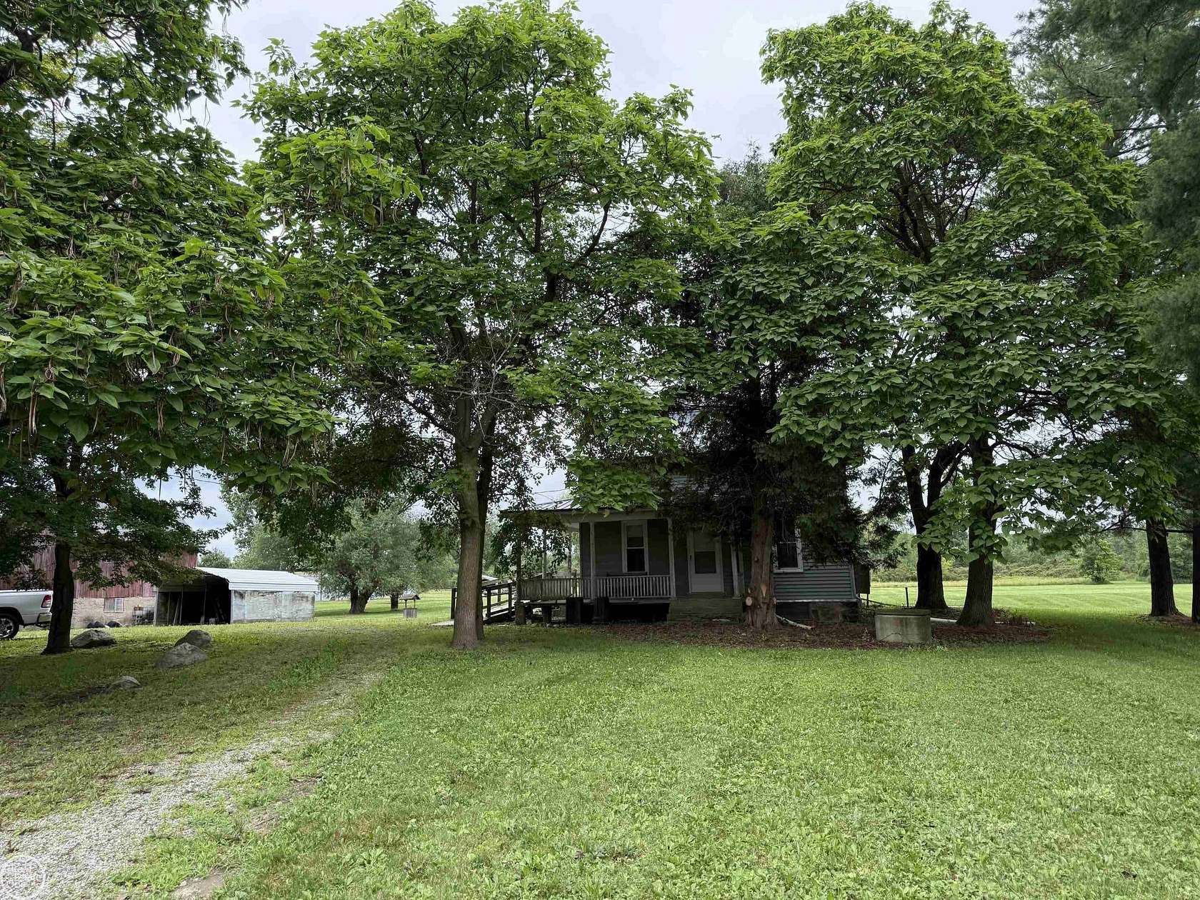 46.8 Acres of Land with Home for Sale in Capac, Michigan