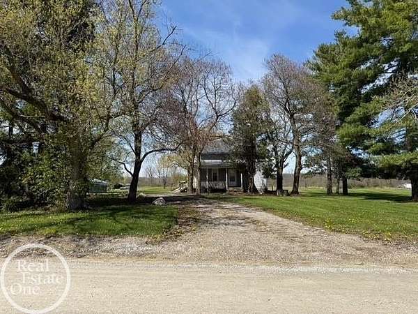 46.8 Acres of Agricultural Land with Home for Sale in Capac, Michigan