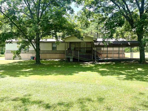 3.27 Acres of Land with Home for Sale in Rison, Arkansas