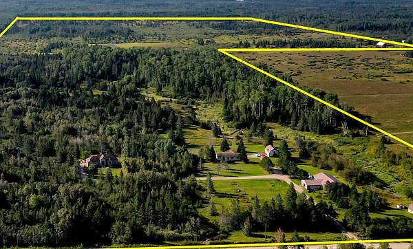 160 Acres of Recreational Land with Home for Sale in Hessel, Michigan