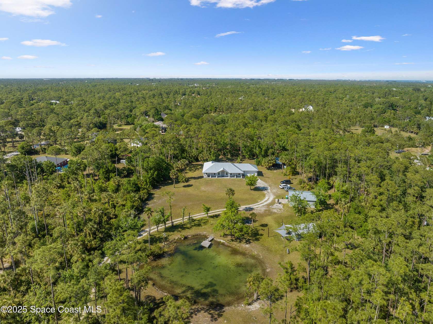 4 Acres of Residential Land with Home for Sale in Grant-Valkaria, Florida
