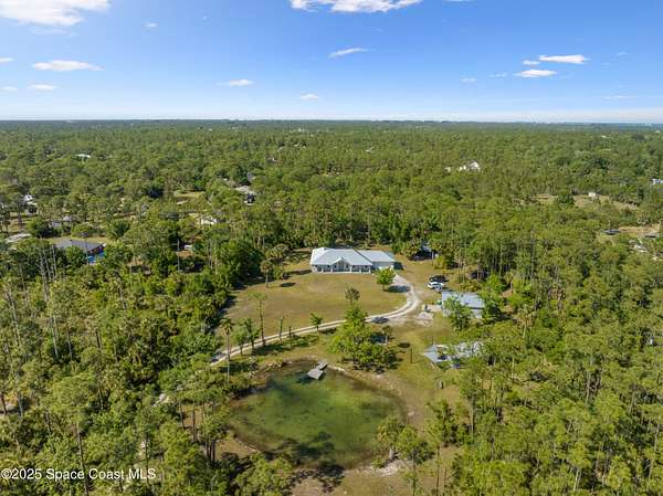 4 Acres of Residential Land with Home for Sale in Grant-Valkaria, Florida