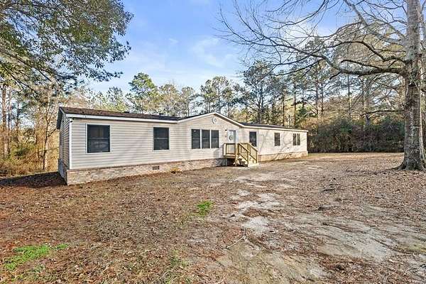 1.5 Acres of Residential Land with Home for Sale in Poplarville, Mississippi