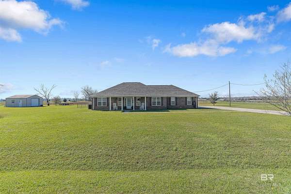 1.64 Acres of Residential Land with Home for Sale in Loxley, Alabama