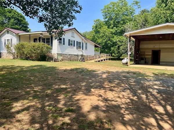 1.75 Acres of Residential Land with Home for Sale in Lindale, Georgia